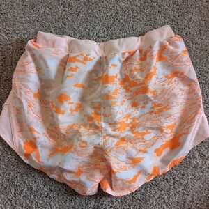 Under Armour Shorts, women's medium, orange and pink camo pattern, liner